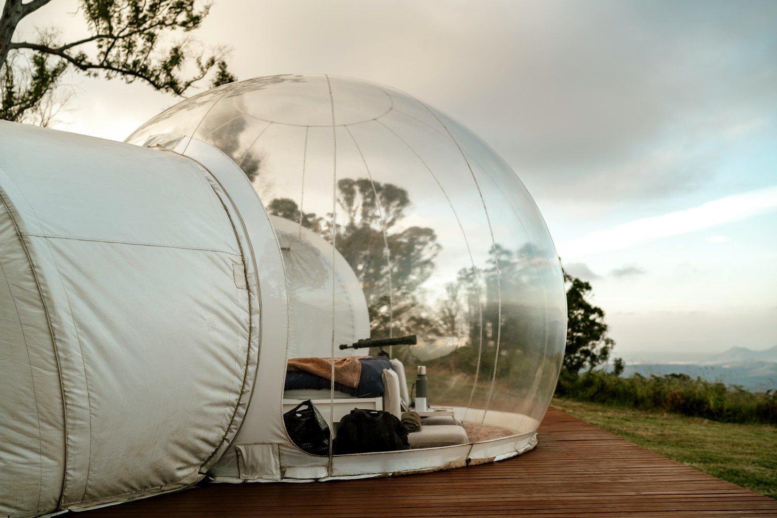 an inflatable tent on a wooden deck